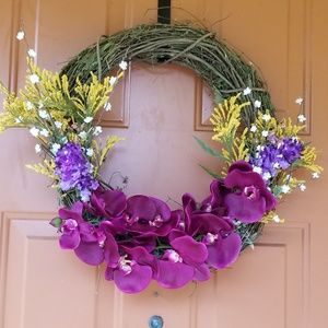 Custom wreath with floral arrangement